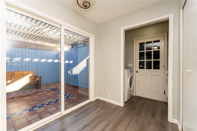 interior space featuring a patio area, washer / dryer, and a pergola