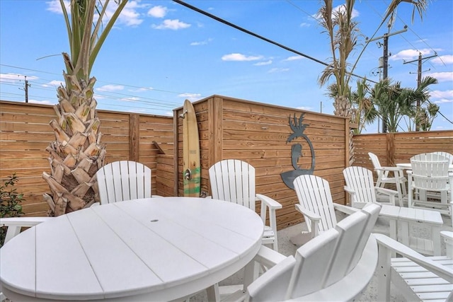 4885 S State Highway 361st St Unit H, Port Aransas, TX 78373 - view of patio featuring outdoor dining space
