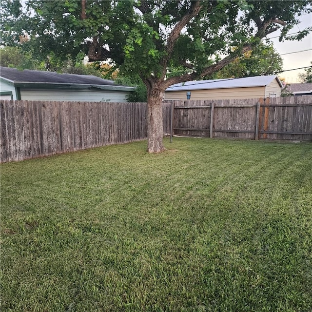 view of yard with fence