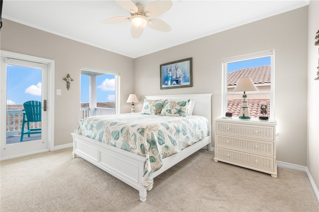 bedroom with ceiling fan, light carpet, crown molding, and access to outside