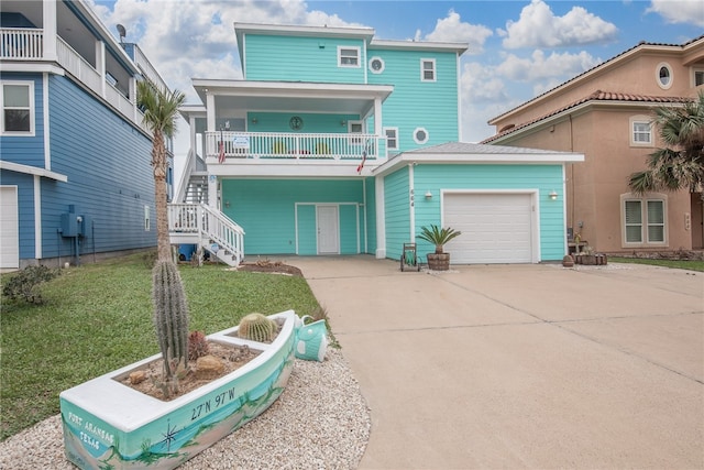 view of front of property with a balcony and a front yard