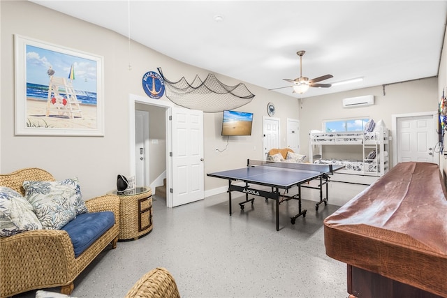 game room with ceiling fan and a wall mounted air conditioner