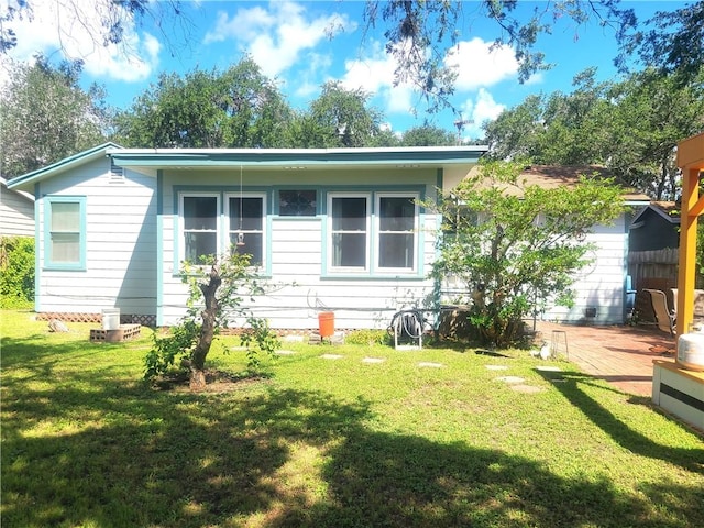 4114 Lowman St, Corpus Christi, TX 78411 - back of house with a yard and a deck