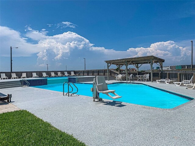 view of pool featuring a pergola and a patio area