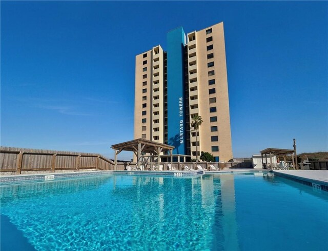 6109 State Highway 361 Unit 1101, Port Aransas, TX 78373 - community pool featuring fence