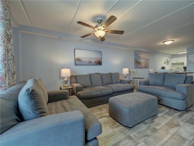 living room with ceiling fan