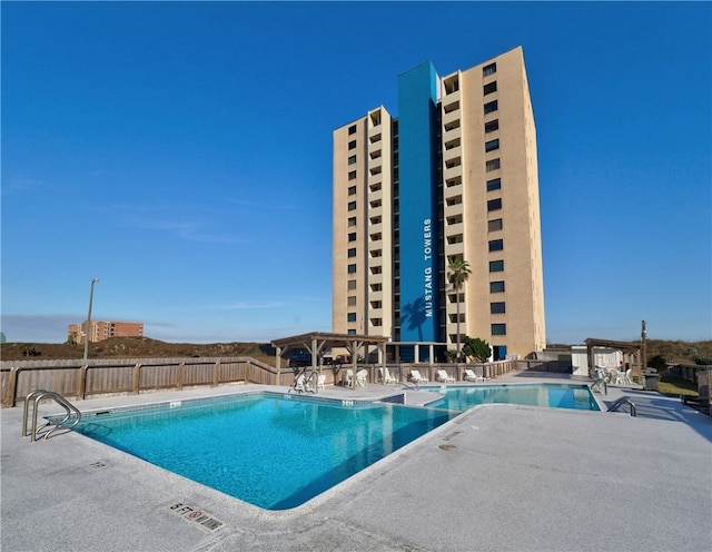 view of pool featuring a patio