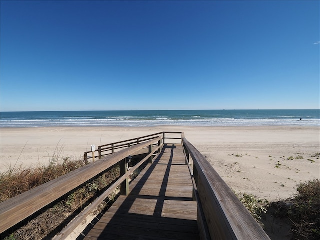 view of home's community with a view of the beach and a water view