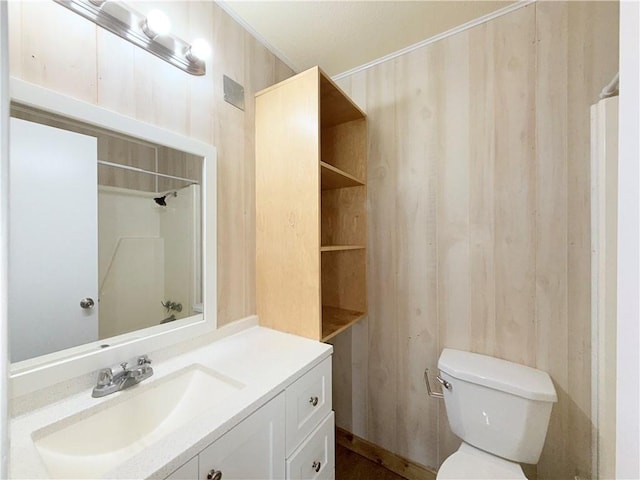 bathroom with toilet and vanity