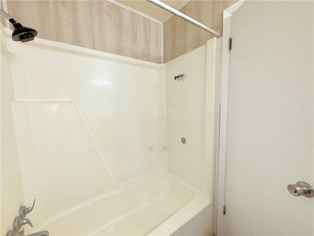 bathroom with shower / tub combination