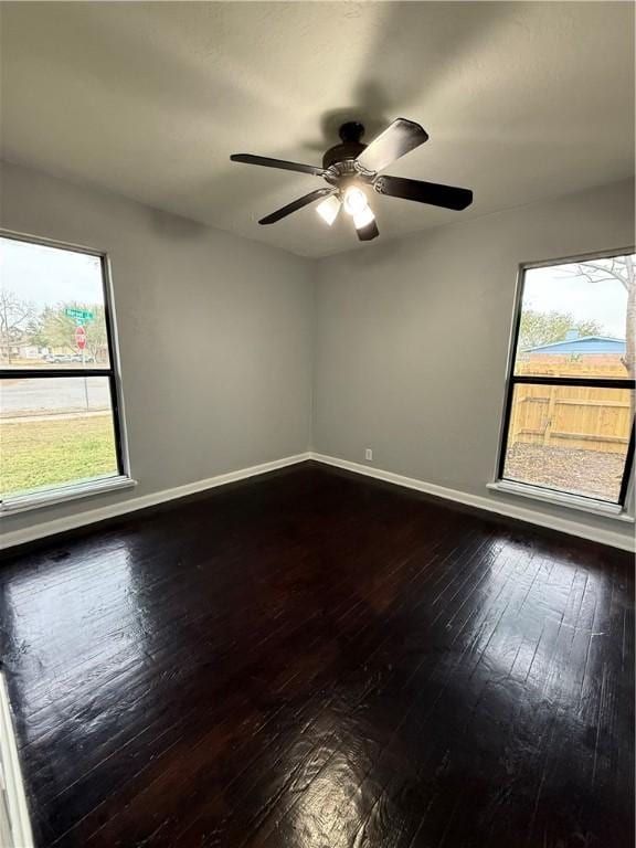 spare room featuring ceiling fan and wood-type flooring