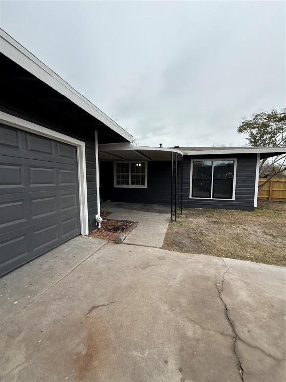 single story home with a garage