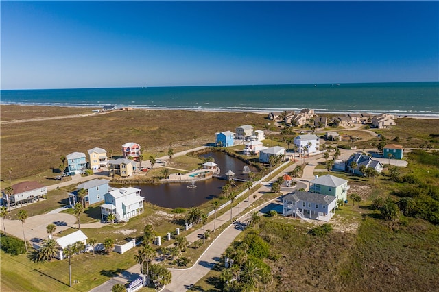 aerial view featuring a beach view and a water view