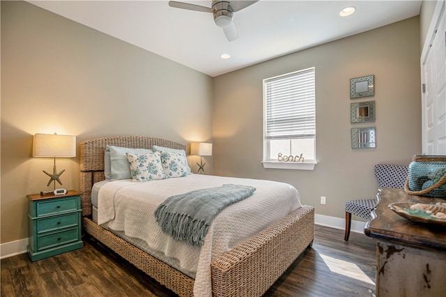 bedroom featuring dark hardwood / wood-style floors and ceiling fan