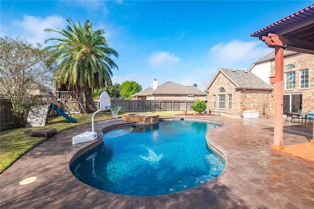 view of pool with an in ground hot tub, a playground, and a patio area