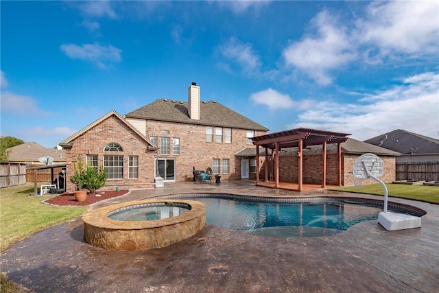 view of swimming pool with an in ground hot tub, a pergola, a patio, and a lawn