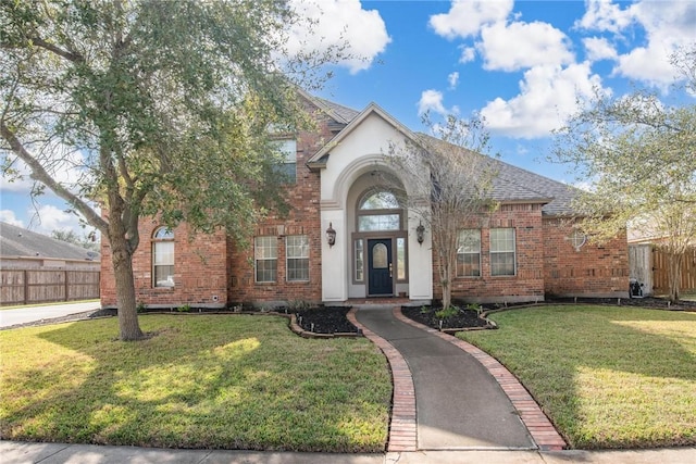 view of front facade featuring a front yard