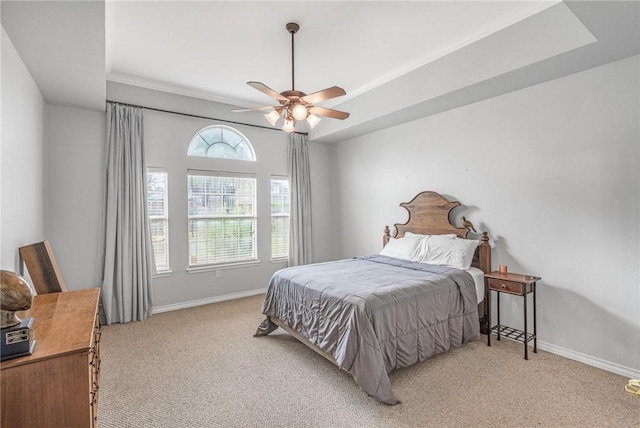 bedroom with ceiling fan and light carpet