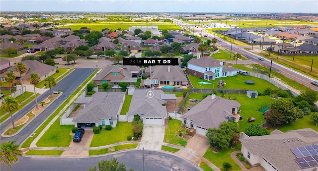 7418 Bar T Dr, Corpus Christi, TX 78414 - aerial overview of property's location with nearby suburban area