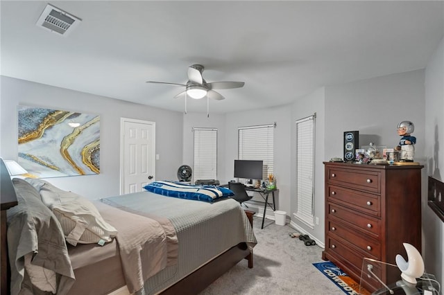 7425 Bourget Dr, Corpus Christi, TX 78413 - bedroom with light carpet, a ceiling fan, and baseboards