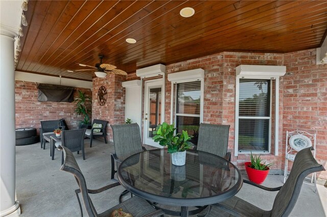7425 Bourget Dr, Corpus Christi, TX 78413 - view of patio / terrace with ceiling fan and outdoor dining space