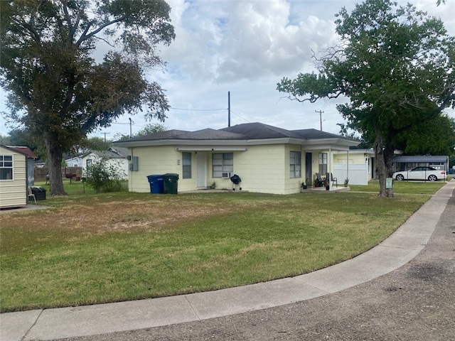 ranch-style home with a front yard