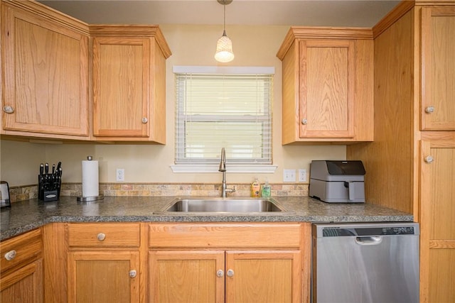 kitchen featuring dishwasher, sink, and decorative light fixtures