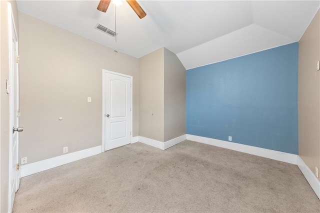 interior space with vaulted ceiling and ceiling fan