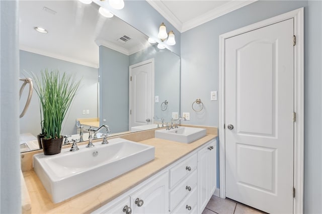 bathroom with vanity, tile patterned floors, and crown molding