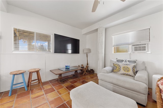 living room featuring cooling unit and ceiling fan