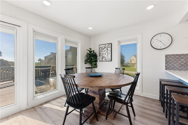 dining area with light wood-type flooring