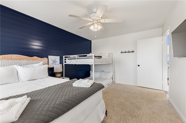 bedroom with light colored carpet and ceiling fan