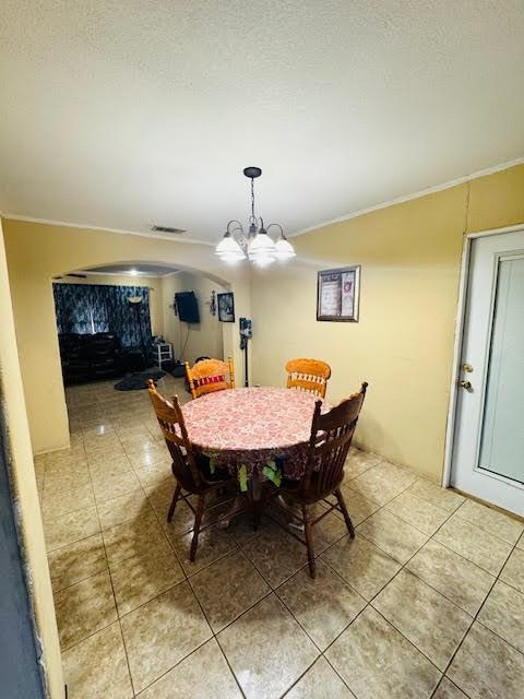 dining area with a chandelier