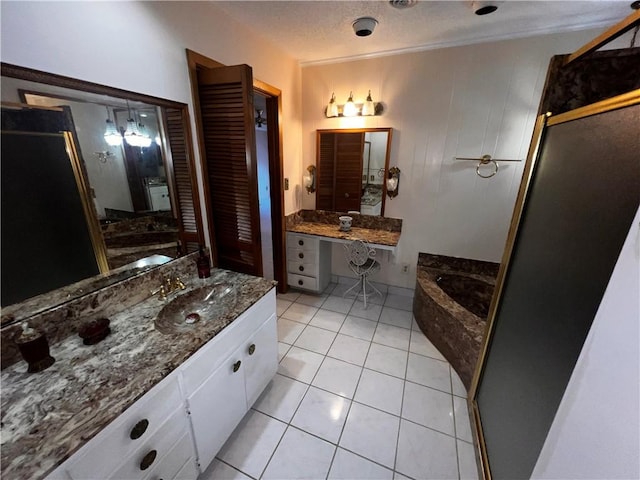5445 Ocean Dr, Corpus Christi, TX 78412 - full bathroom with a garden tub, a stall shower, vanity, and tile patterned floors
