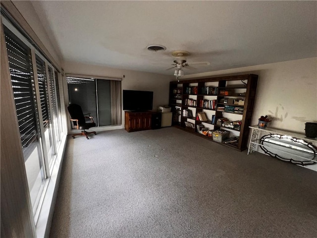 5445 Ocean Dr, Corpus Christi, TX 78412 - unfurnished room featuring a ceiling fan and carpet flooring