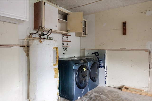 laundry room featuring separate washer and dryer and water heater