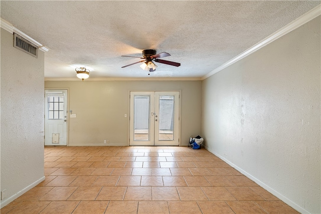 unfurnished room with french doors, a textured ceiling, light tile patterned floors, ornamental molding, and ceiling fan