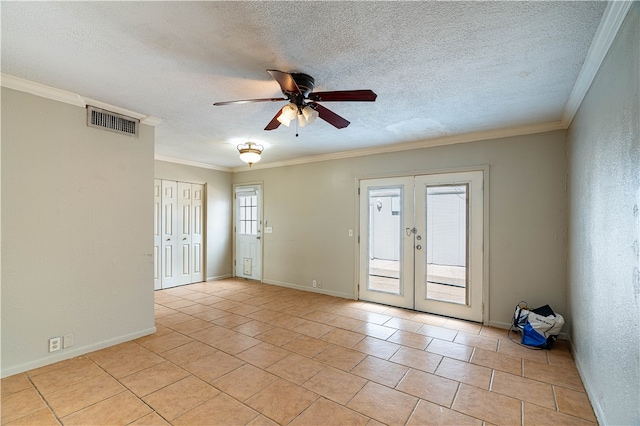 tiled empty room featuring ceiling fan, crown molding, and french doors