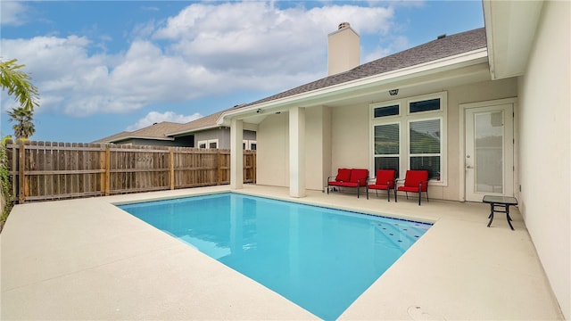 view of pool featuring a patio