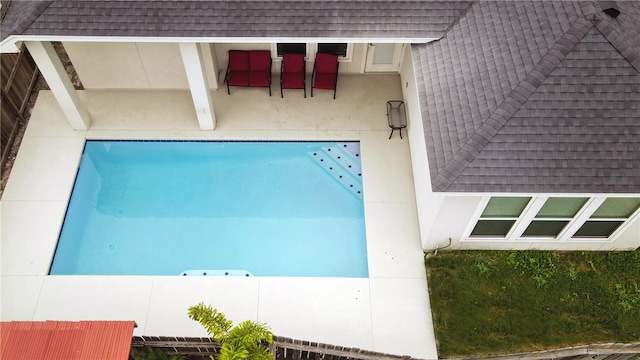 view of pool with a patio