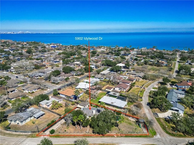 aerial view with a water view and a residential view