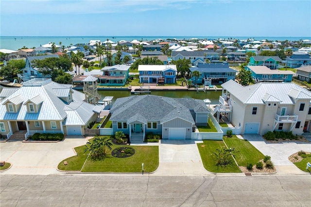 drone / aerial view featuring a water view