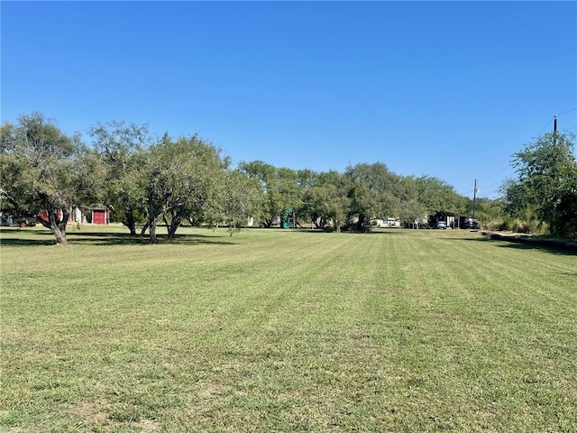 view of community featuring a lawn