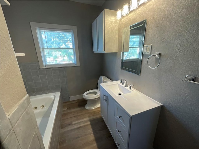 3662 Monterrey, Corpus Christi, TX 78411 - full bath with wood finished floors, a jetted tub, and vanity