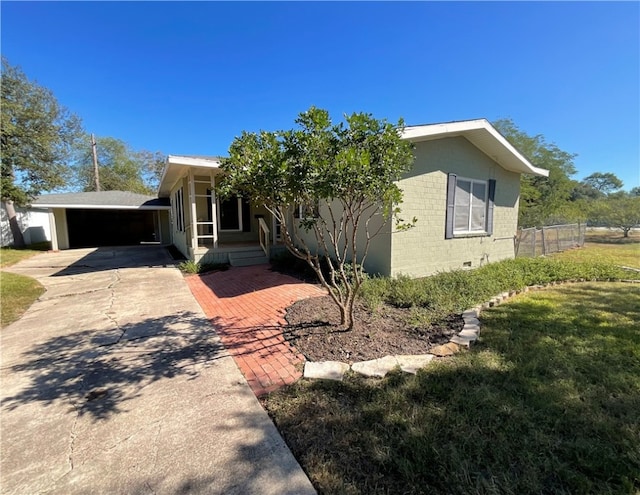 view of front of home with a front lawn and a garage