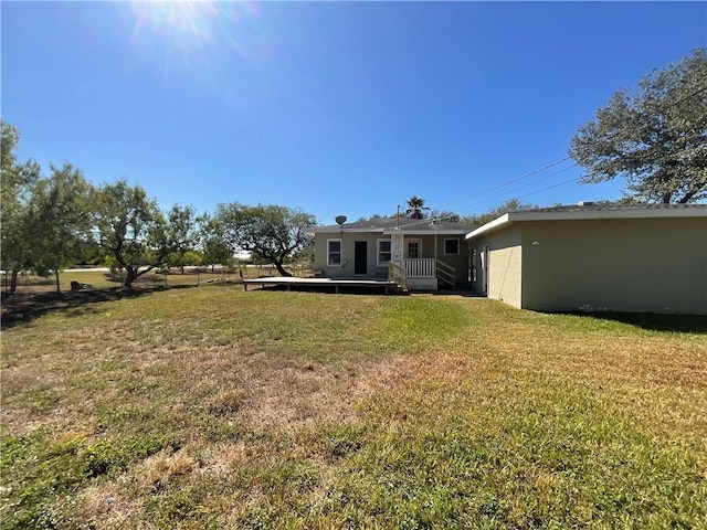 3662 Monterrey, Corpus Christi, TX 78411 - view of grassy yard with a deck
