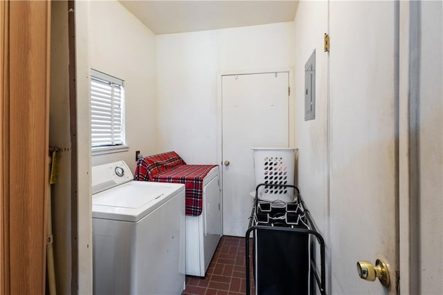 washroom with laundry area, electric panel, and washing machine and clothes dryer