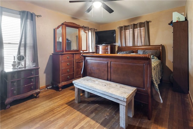 bedroom featuring light wood-style floors and ceiling fan