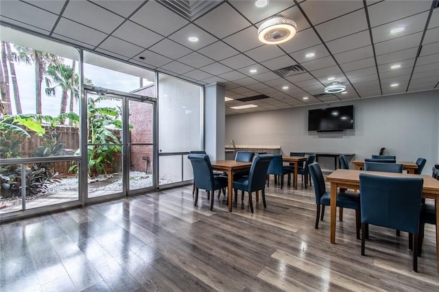 4600 Ocean Dr Unit 505, Corpus Christi, TX 78412 - dining room with wood finished floors and expansive windows