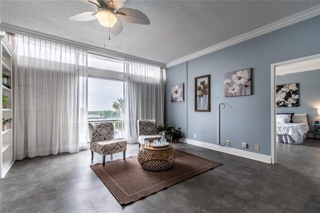 4600 Ocean Dr Unit 505, Corpus Christi, TX 78412 - living area featuring ornamental molding, a textured ceiling, and a ceiling fan